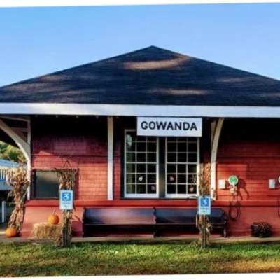 a bus parked in front of a house