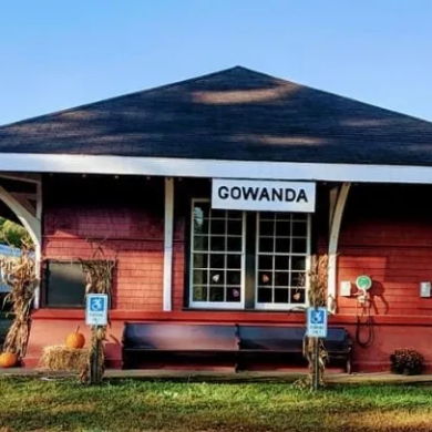a bus parked in front of a house