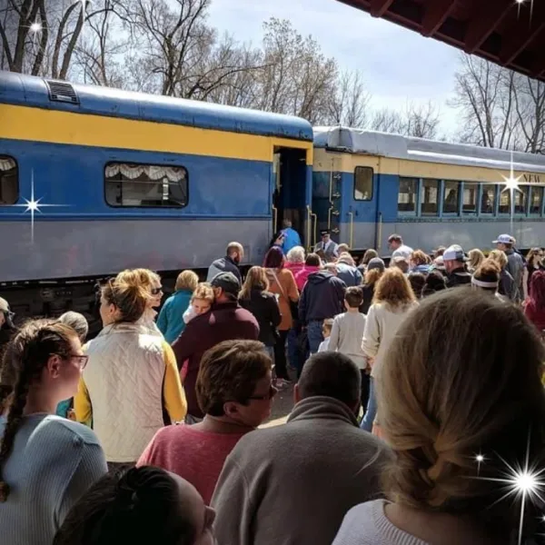 a group of people standing in front of a crowd