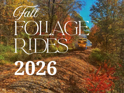 Train on forested track with autumn leaves, text: 'Fall Foliage Rides 2026'.